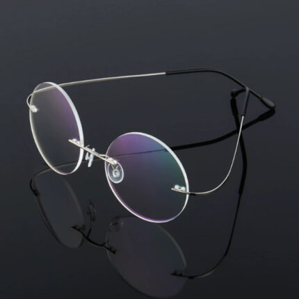 Lunettes rétro rondes sans monture en alliage de titane ultra-élastiques