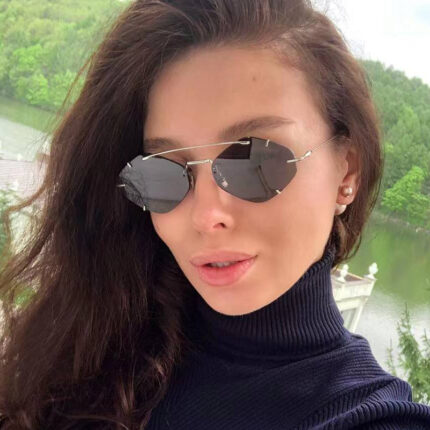 Lunettes de soleil sans cadre en métal à la mode pour femmes